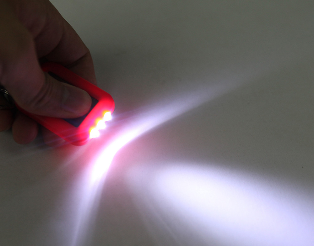 Solar-Powered LED Flashlight Keychain Handy Neat Bright
